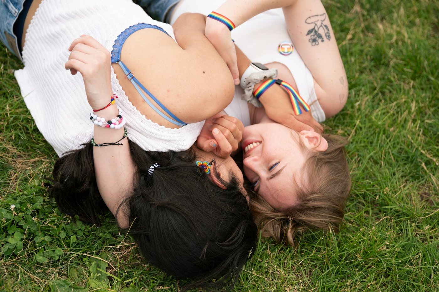 Solo female LGBTQ travelers enjoying serene landscapes