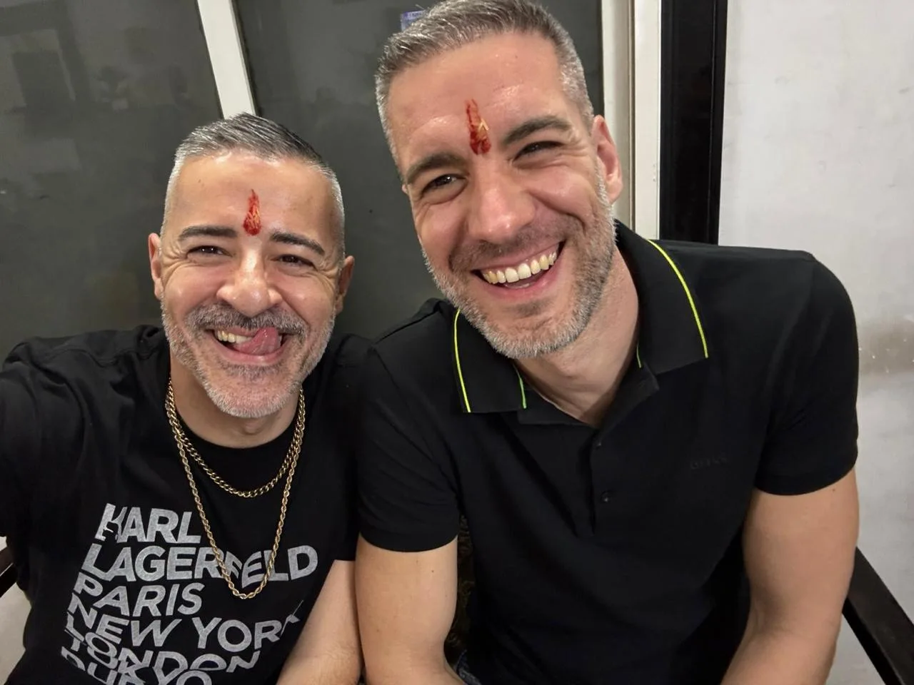 Two travelers smiling together